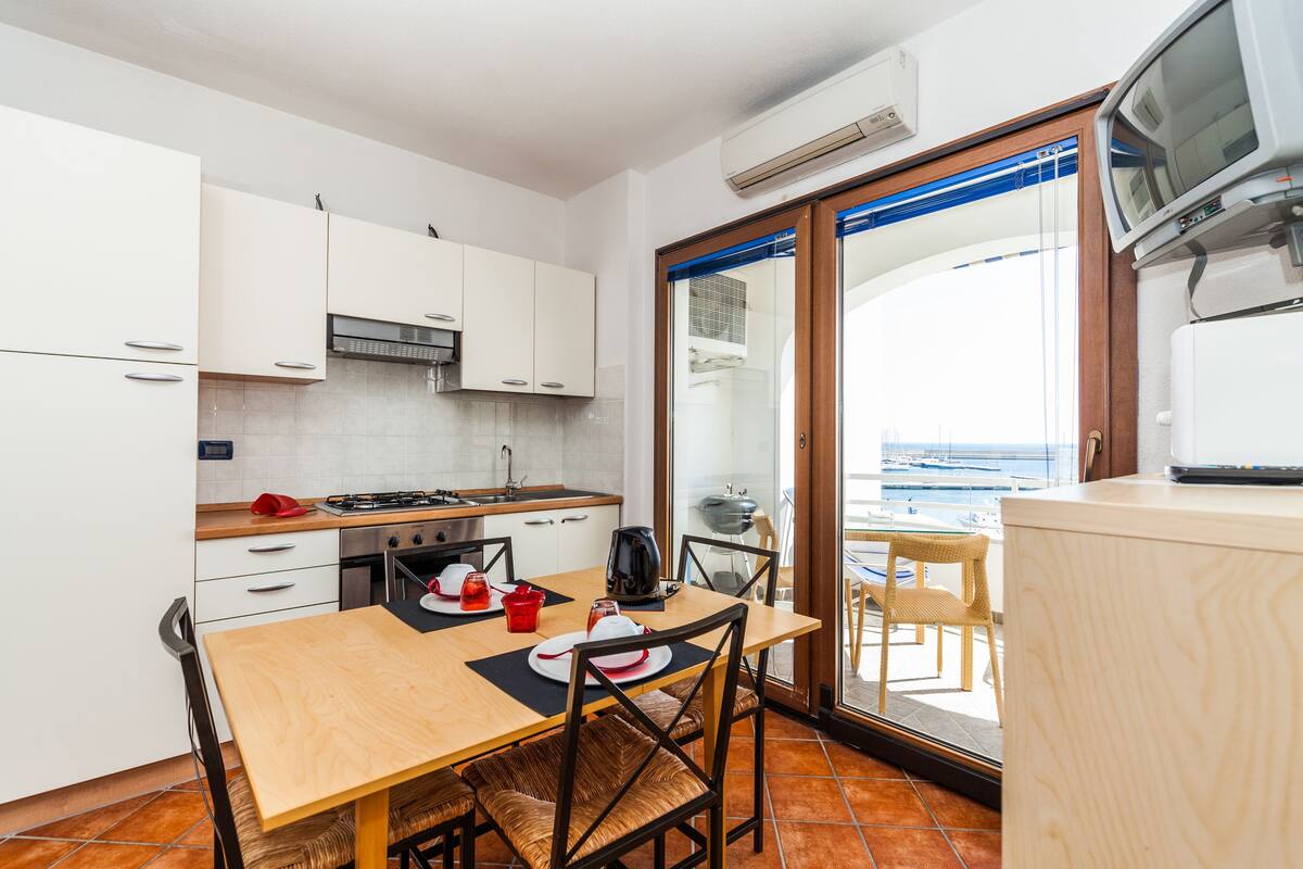 apartment, 1 bedroom, sea view | 2 bedrooms, minibar, in-room safe, desk