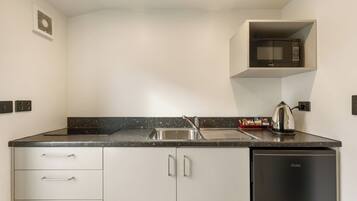 Mini-fridge, microwave, stovetop, electric kettle