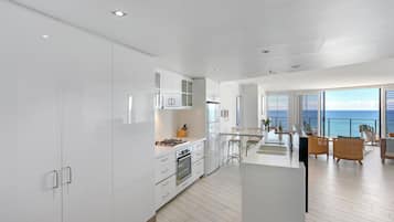 Fridge, microwave, stovetop, coffee/tea maker