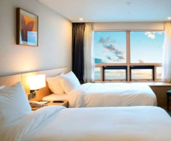 Standard Room, 2 Twin Beds, Non Smoking | Down comforters, in-room safe, desk, soundproofing