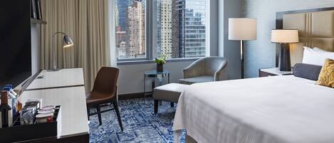 Luxe beddengoed, een minibar, een kluis op de kamer