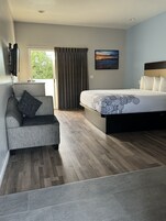 Tabla de planchar con plancha, wifi gratis y ropa de cama 