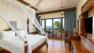 Minibar, desk, laptop workspace, iron/ironing board