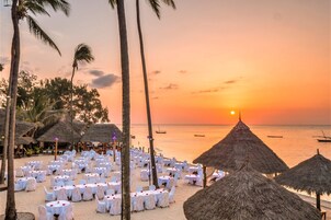 Private beach, white sand, sun loungers, beach umbrellas