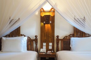 Minibar, desk, laptop workspace, iron/ironing board - Turaco Nungwi Resort, a Tribute Portfolio Hotel (Nungwi)