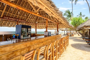 4 bars/lounges, poolside bar, beach bar