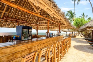 4 bars/lounges, poolside bar, beach bar