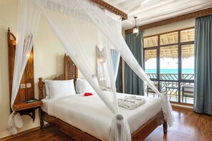 Room, 1 Queen Bed, Balcony (View) | Minibar, desk, laptop workspace, iron/ironing board - Turaco Nungwi Resort, a Tribute Portfolio Hotel (Nungwi)