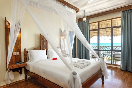 Room, 1 Queen Bed, Balcony (View) | Minibar, desk, laptop workspace, iron/ironing board. Turaco Nungwi Resort, a Tribute Portfolio Hotel