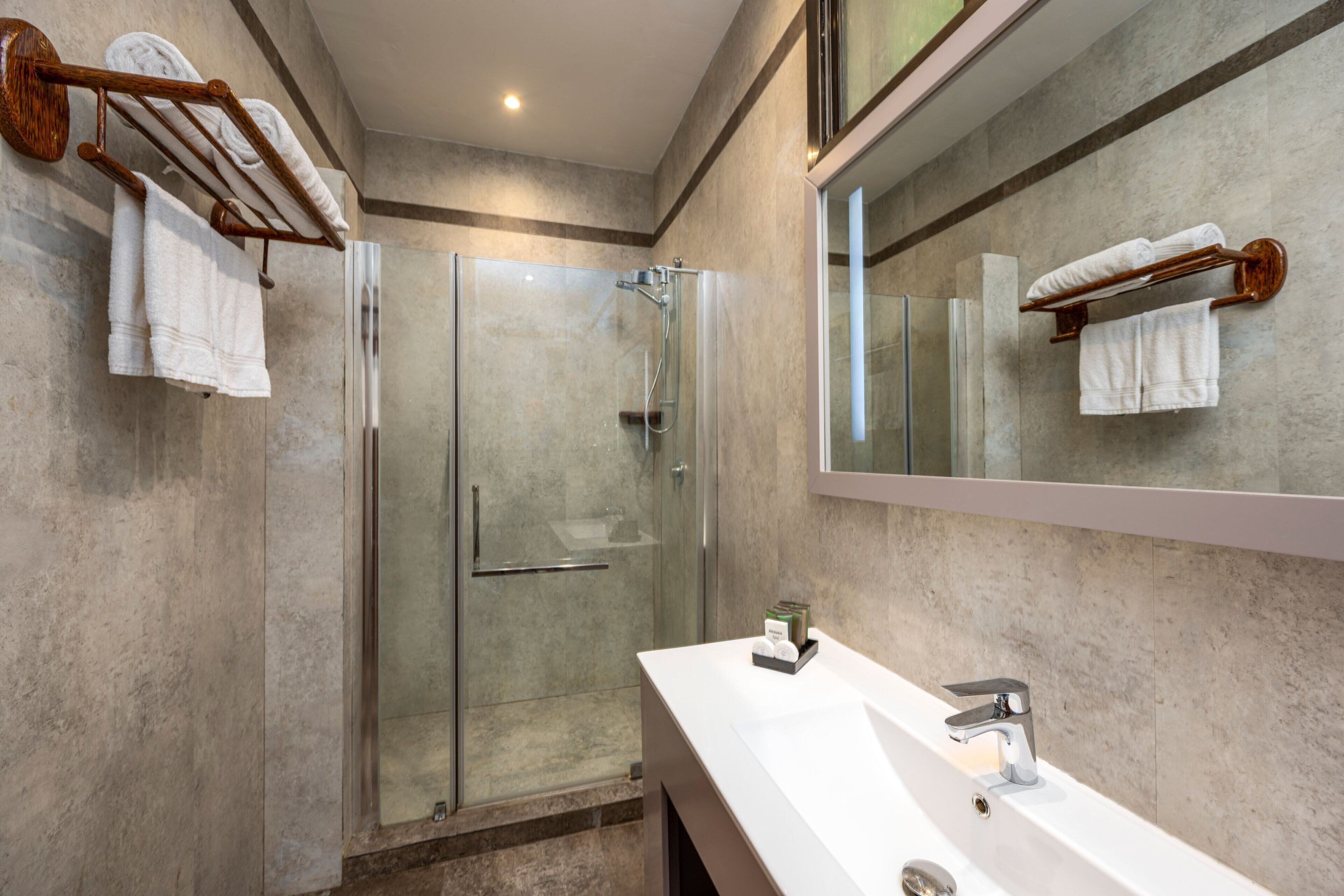 shower, free toiletries, hair dryer, towels