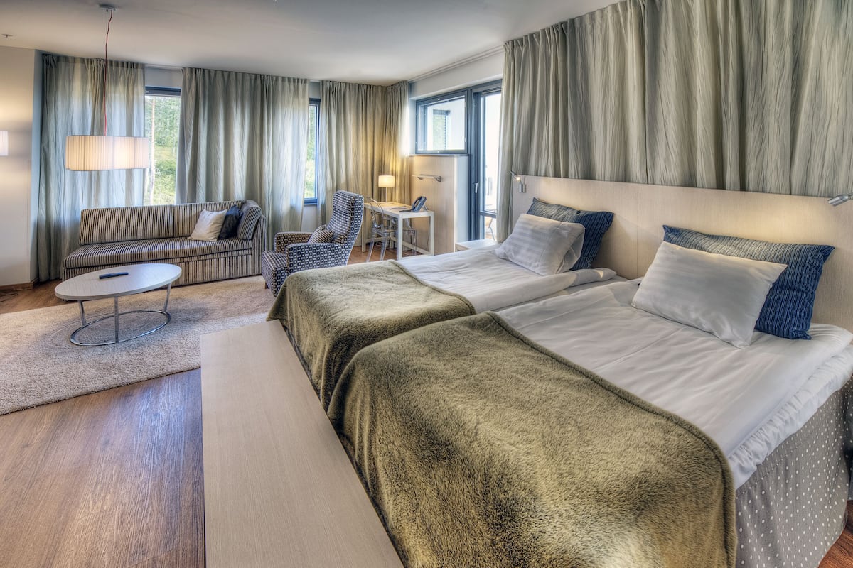 Hypoallergeen beddengoed, een minibar, een kluis op de kamer, een bureau