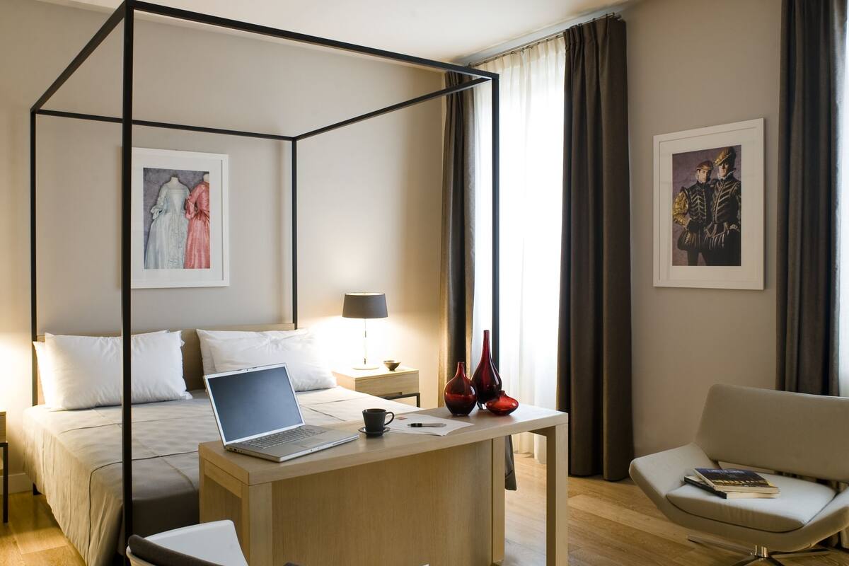 Premium bedding, desk, blackout drapes, soundproofing