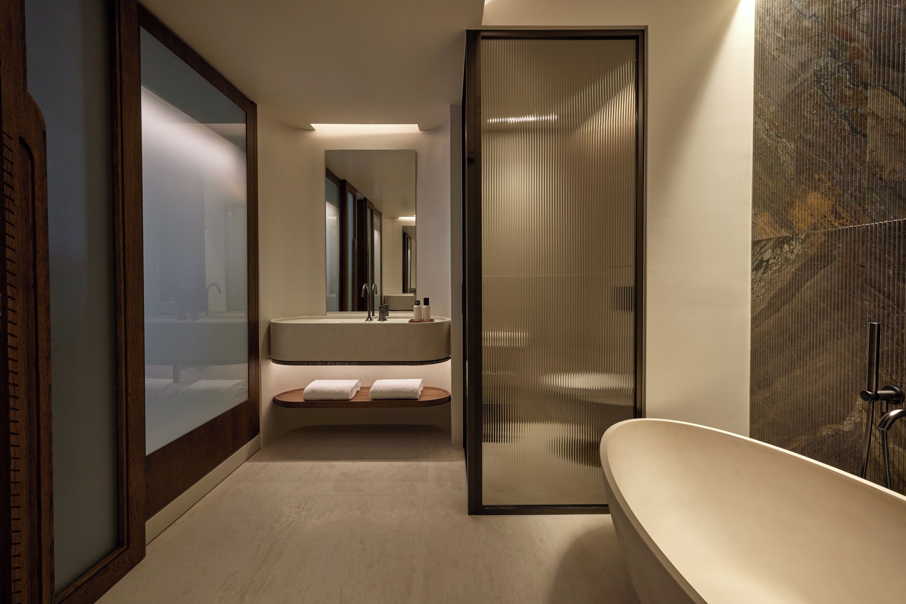 the collection two bedroom suite sea view with private pool | bathroom | combined shower/bathtub, rainfall showerhead, designer toiletries