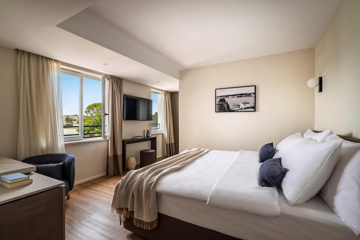 Room for 2 Seaside - Villa Ulixes | 1 bedroom, in-room safe, desk, iron/ironing board
