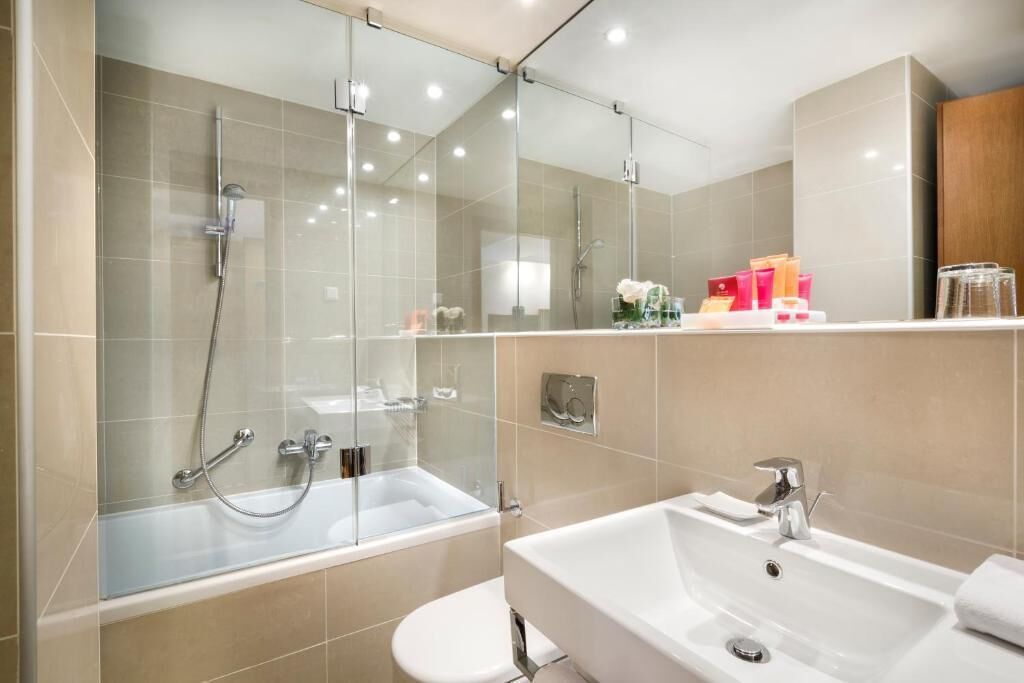 one bedroom suite | bathroom | free toiletries, hair dryer, towels, toilet paper