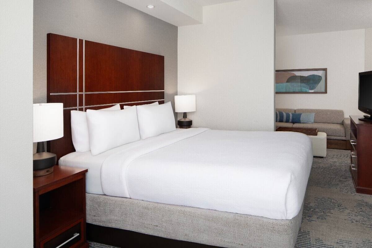 Premium bedding, desk, blackout drapes, iron/ironing board