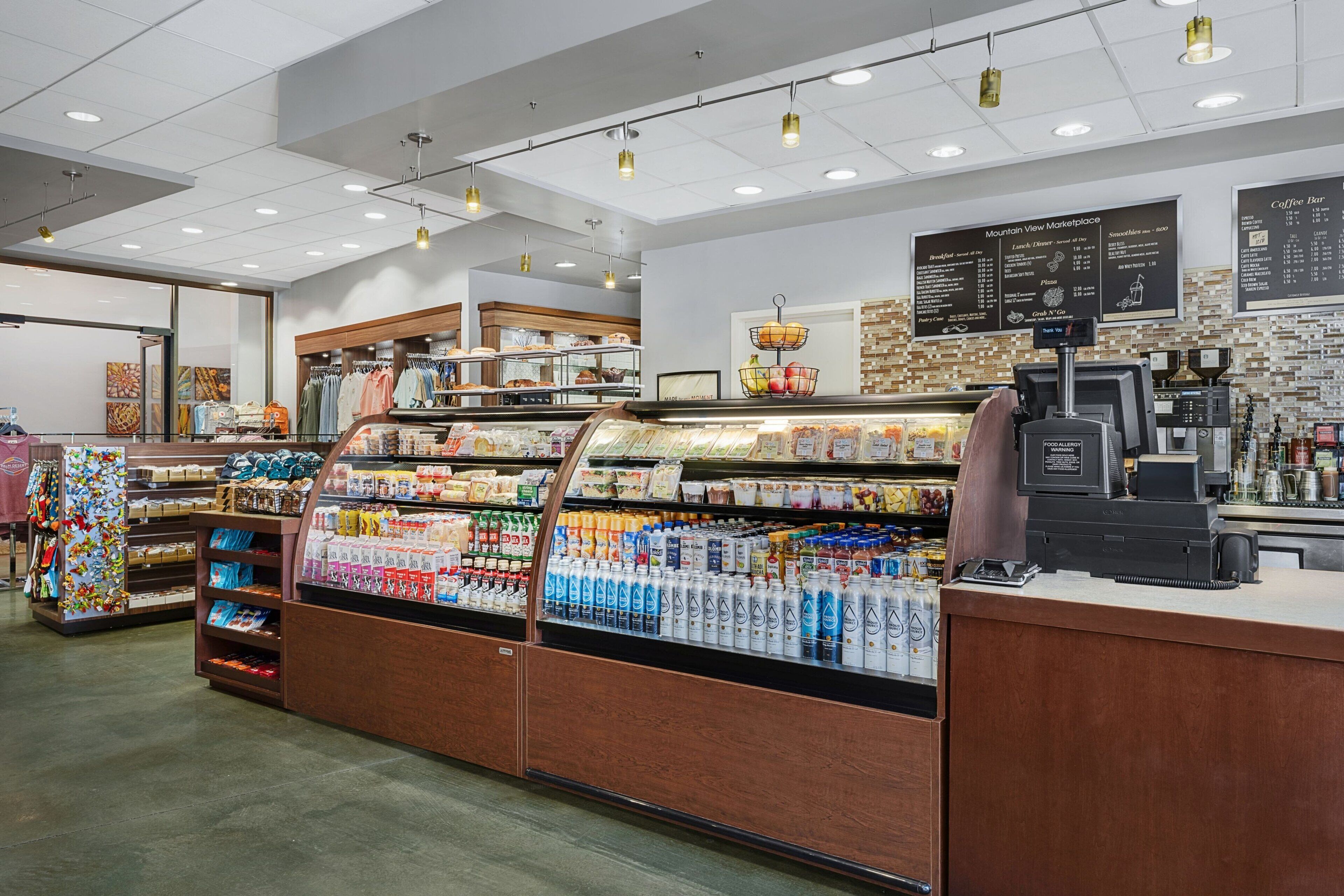 A grocery store with refrigerated sections, a coffee bar, and a deli counter.