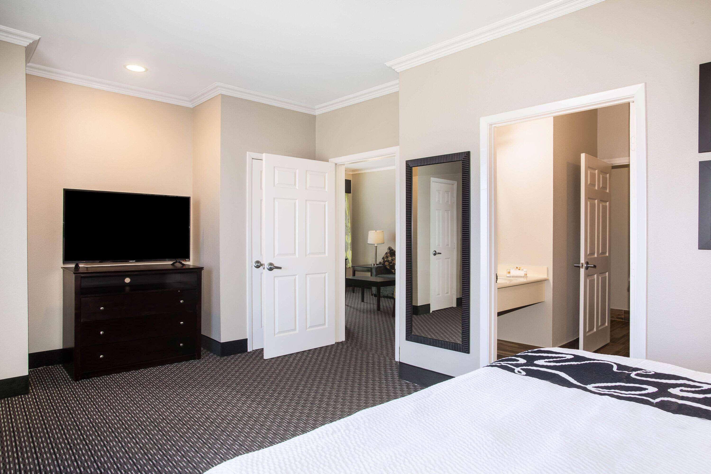 desk, blackout curtains, iron/ironing board, free cots/infant beds