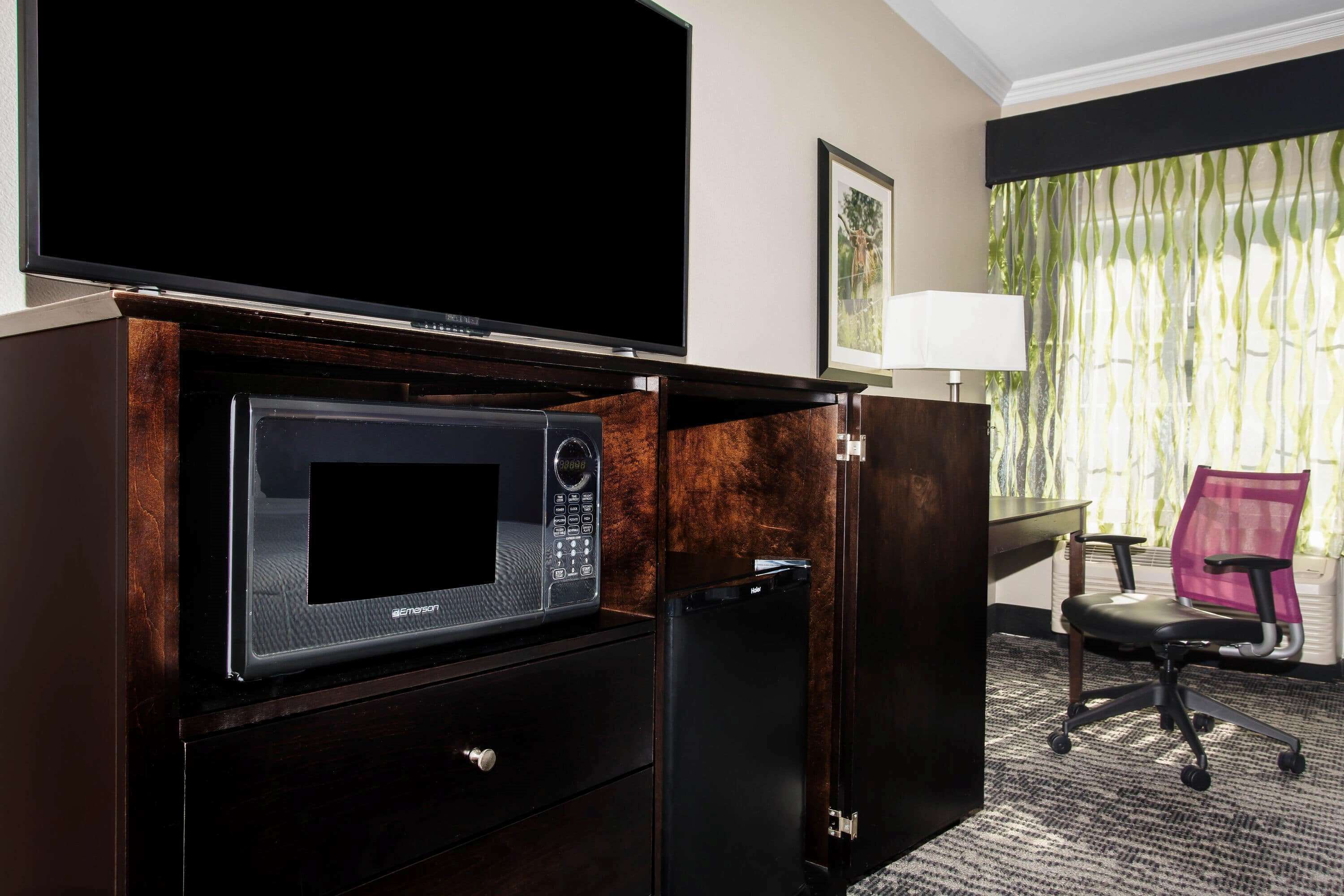 desk, blackout curtains, iron/ironing board, free cots/infant beds