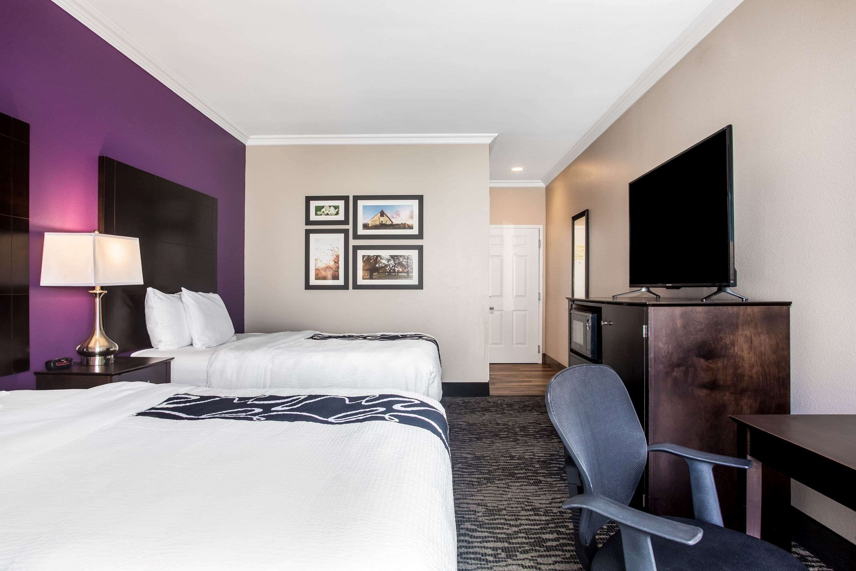 desk, blackout curtains, iron/ironing board, free cots/infant beds