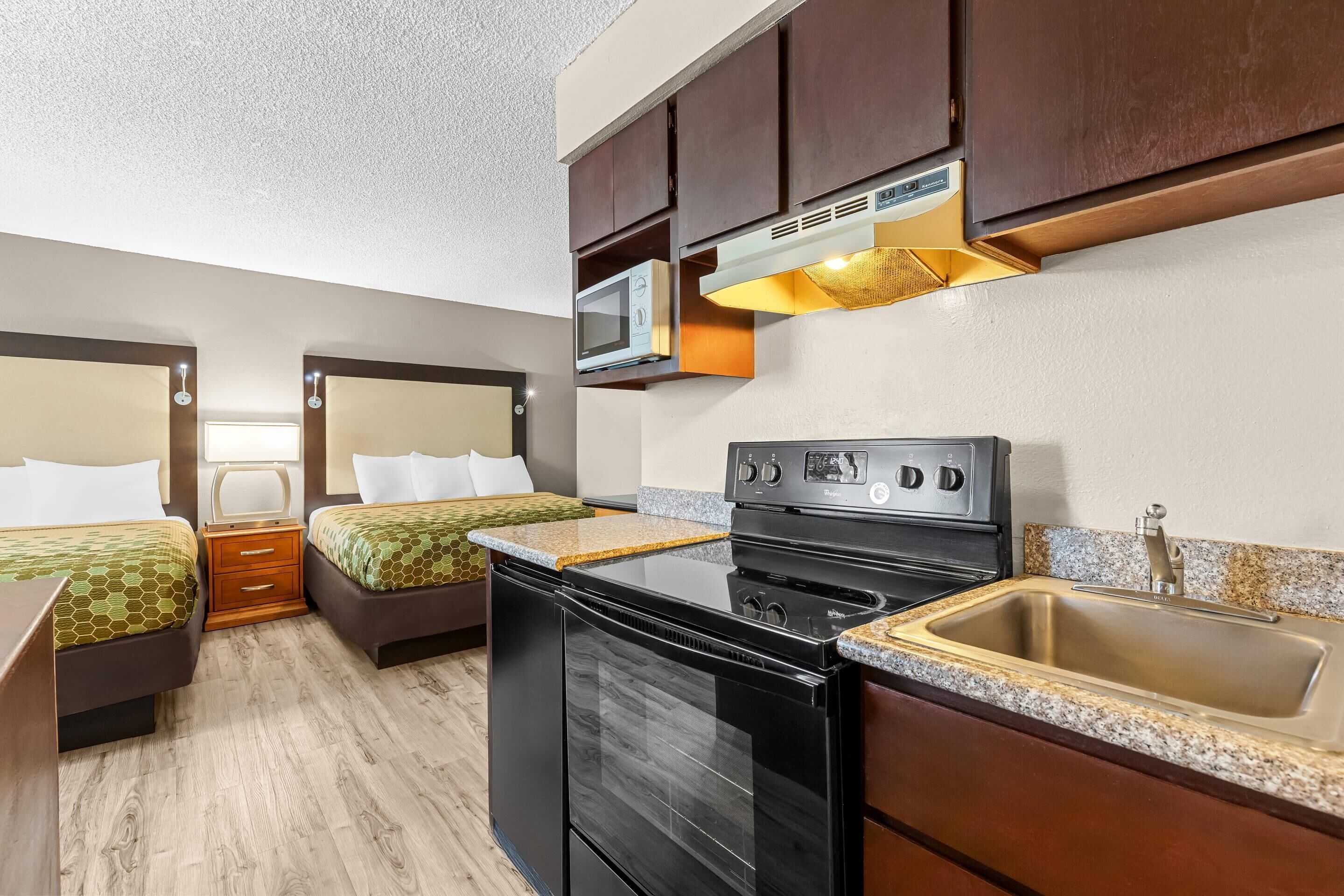 Suite, Multiple Beds, Non Smoking (Efficiency) | Desk, blackout drapes, iron/ironing board, free WiFi