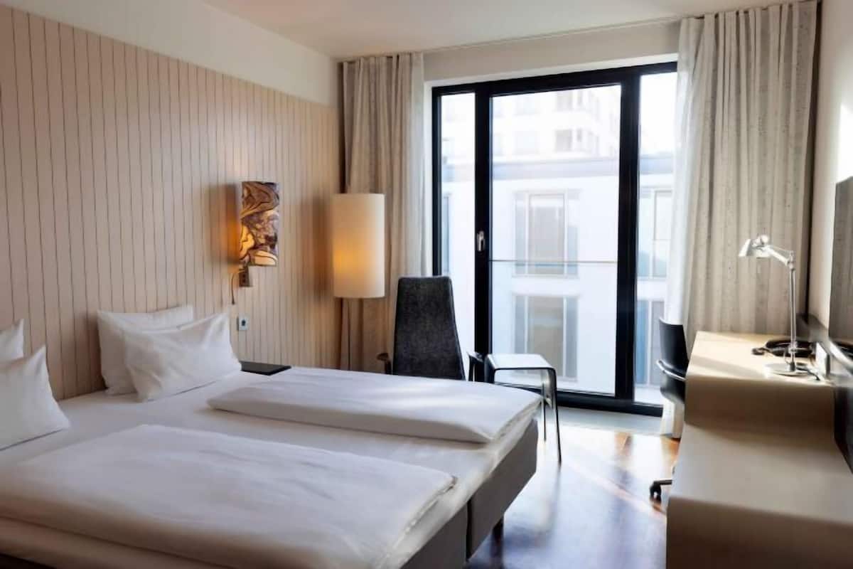 Hypo-allergenic bedding, in-room safe, desk, laptop workspace