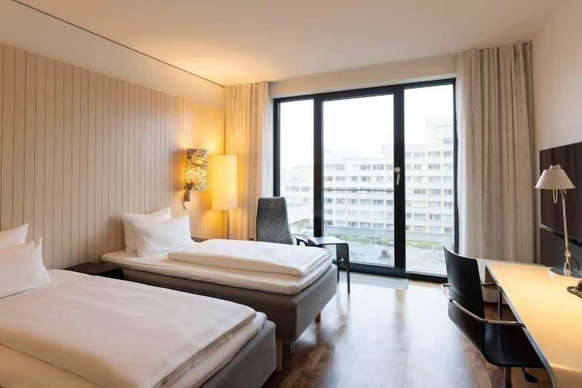 Hypo-allergenic bedding, in-room safe, desk, laptop workspace