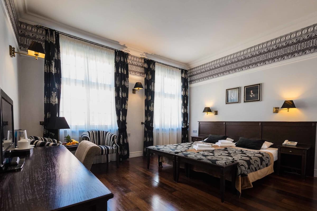 Classic Double or Twin Room | Pillowtop beds, minibar, in-room safe, cribs/infant beds