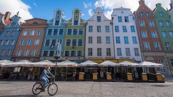 Experience the charm of a historic cobblestone square, lined with unique restaurants and bars.