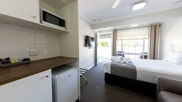 Basic Double Room, 1 Queen Bed (No Pets Permitted) | Pillow-top beds, blackout curtains, bed sheets