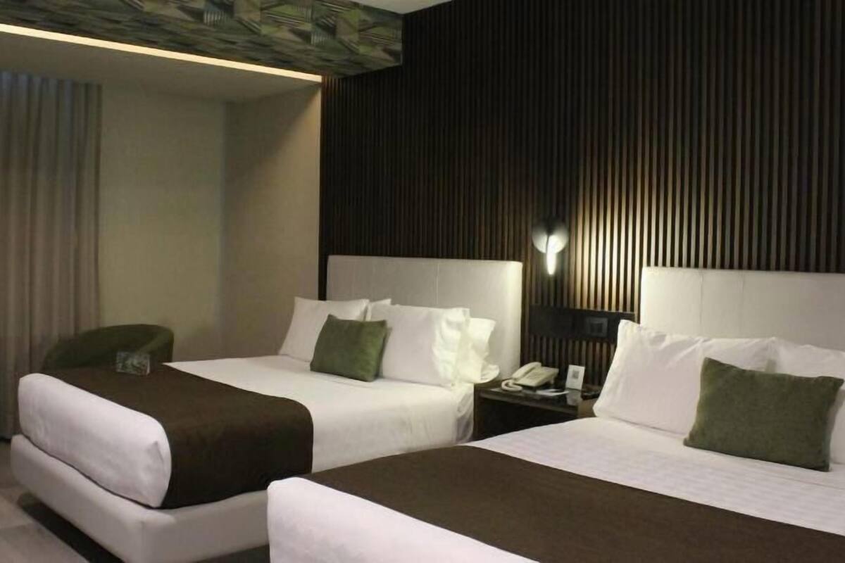 Premium bedding, down duvets, pillow-top beds, in-room safe