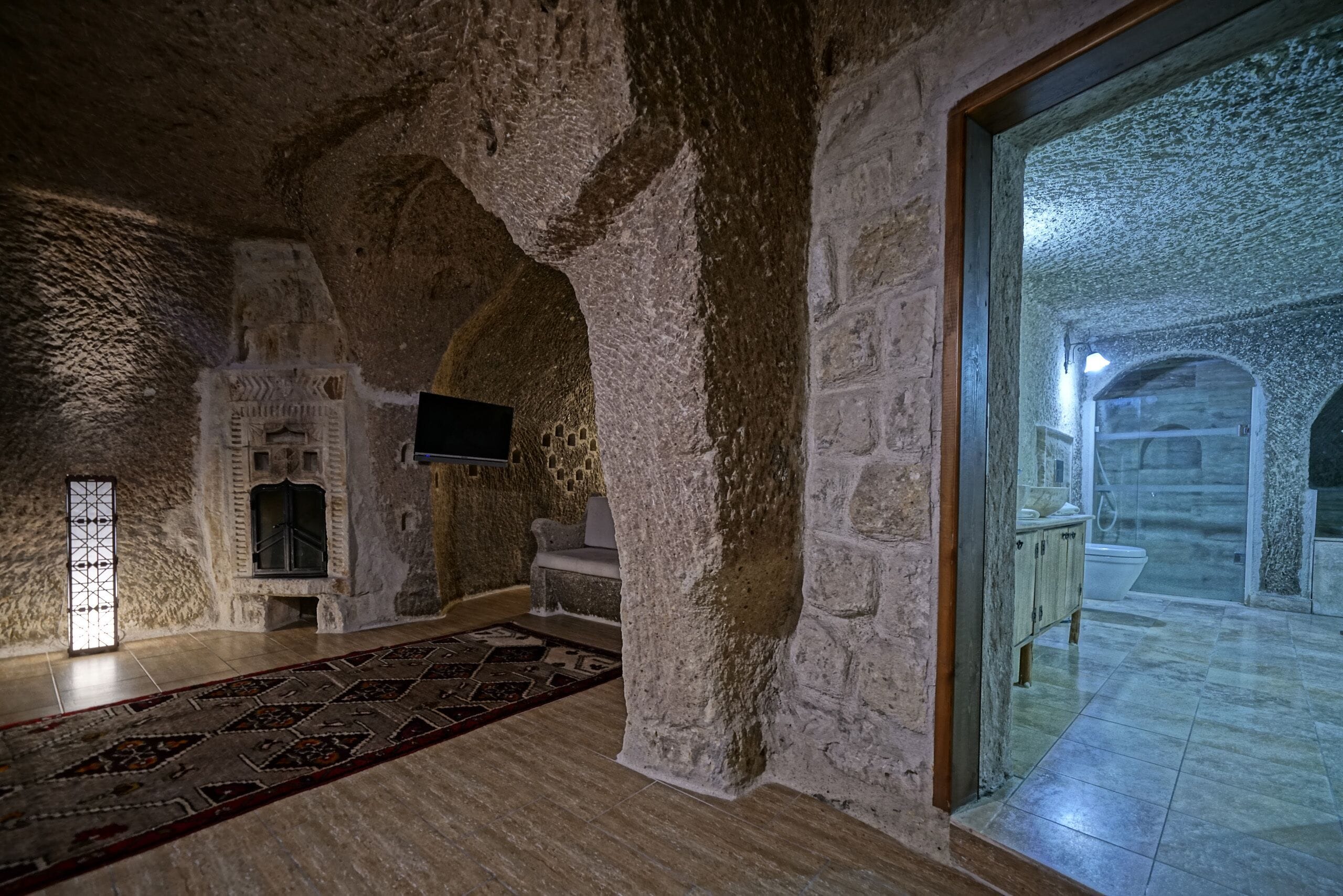 sultan cave suite | bathroom | shower, designer toiletries, hair dryer, slippers