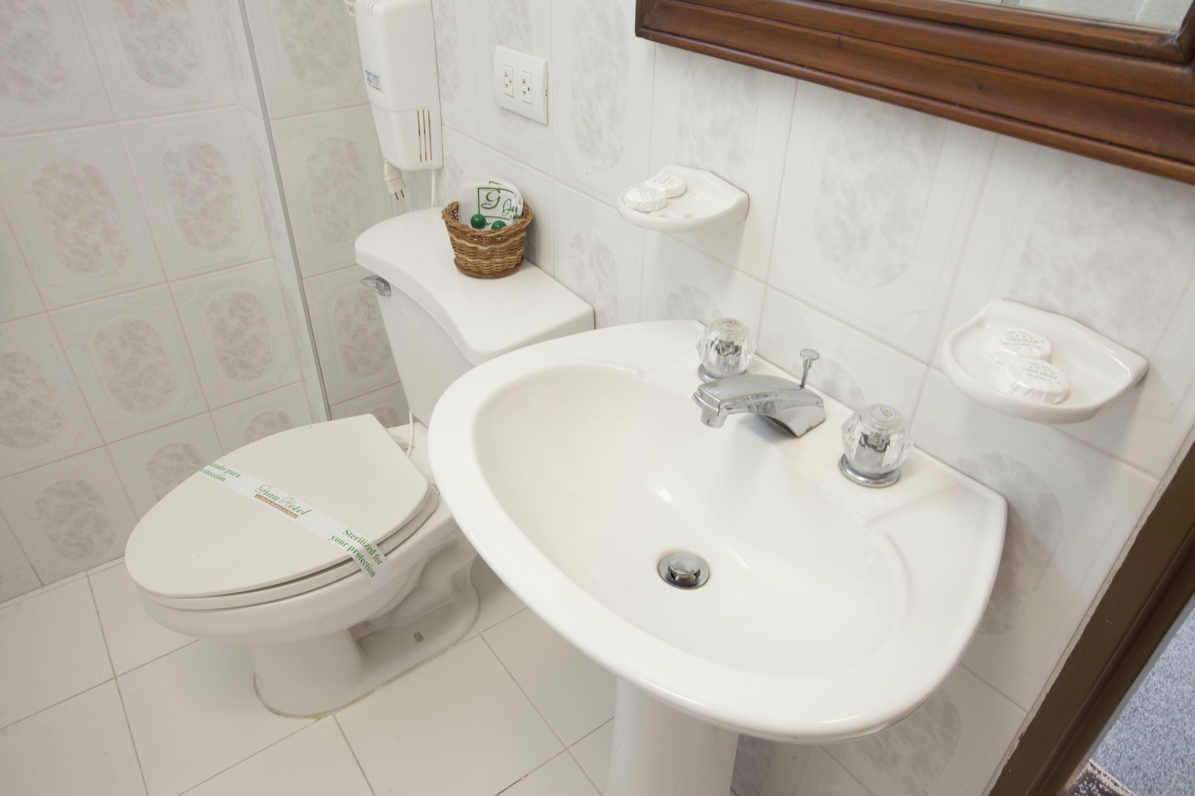 shower, rainfall showerhead, hair dryer, towels