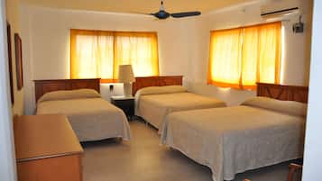 Quarto standard | Cofres nos quartos, Wi-Fi de cortesia, roupa de cama