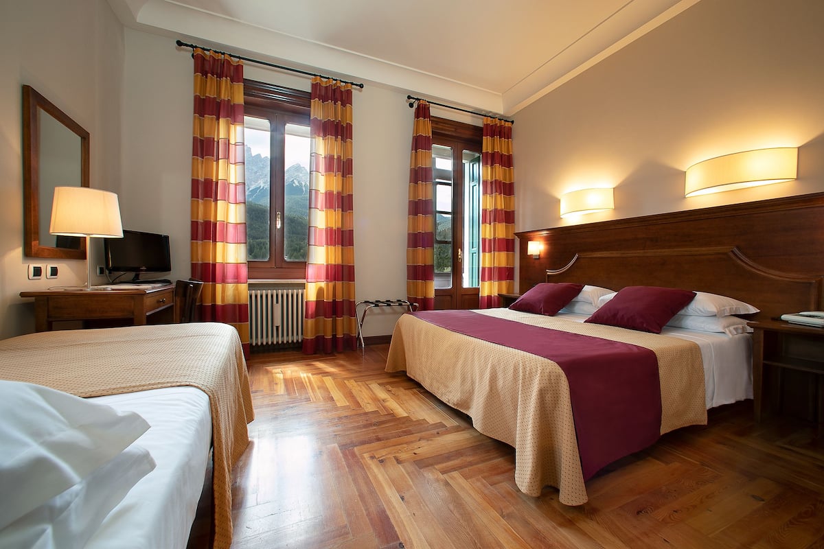 Triple Room | In-room safe, desk, soundproofing, cots/infant beds