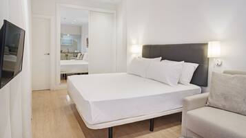 Donsdekens, pillowtop-bedden, een kluis op de kamer