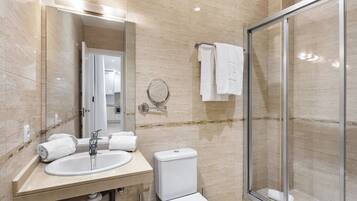 Shower, eco-friendly toiletries, hair dryer, towels