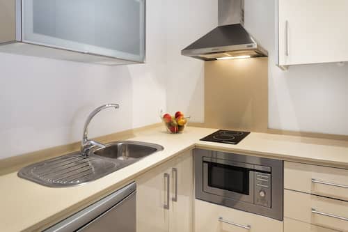 Fridge, microwave, stovetop, coffee/tea maker