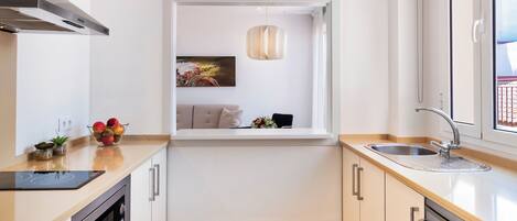 Fridge, microwave, stovetop, coffee/tea maker