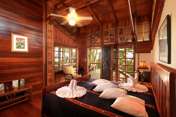 Deluxe Room | Down comforters, minibar, in-room safe, individually decorated