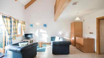 Appartement Galerie, 1 chambre | Coin séjour | Télévision à écran plat de 32 pouces avec chaînes numériques, télévision