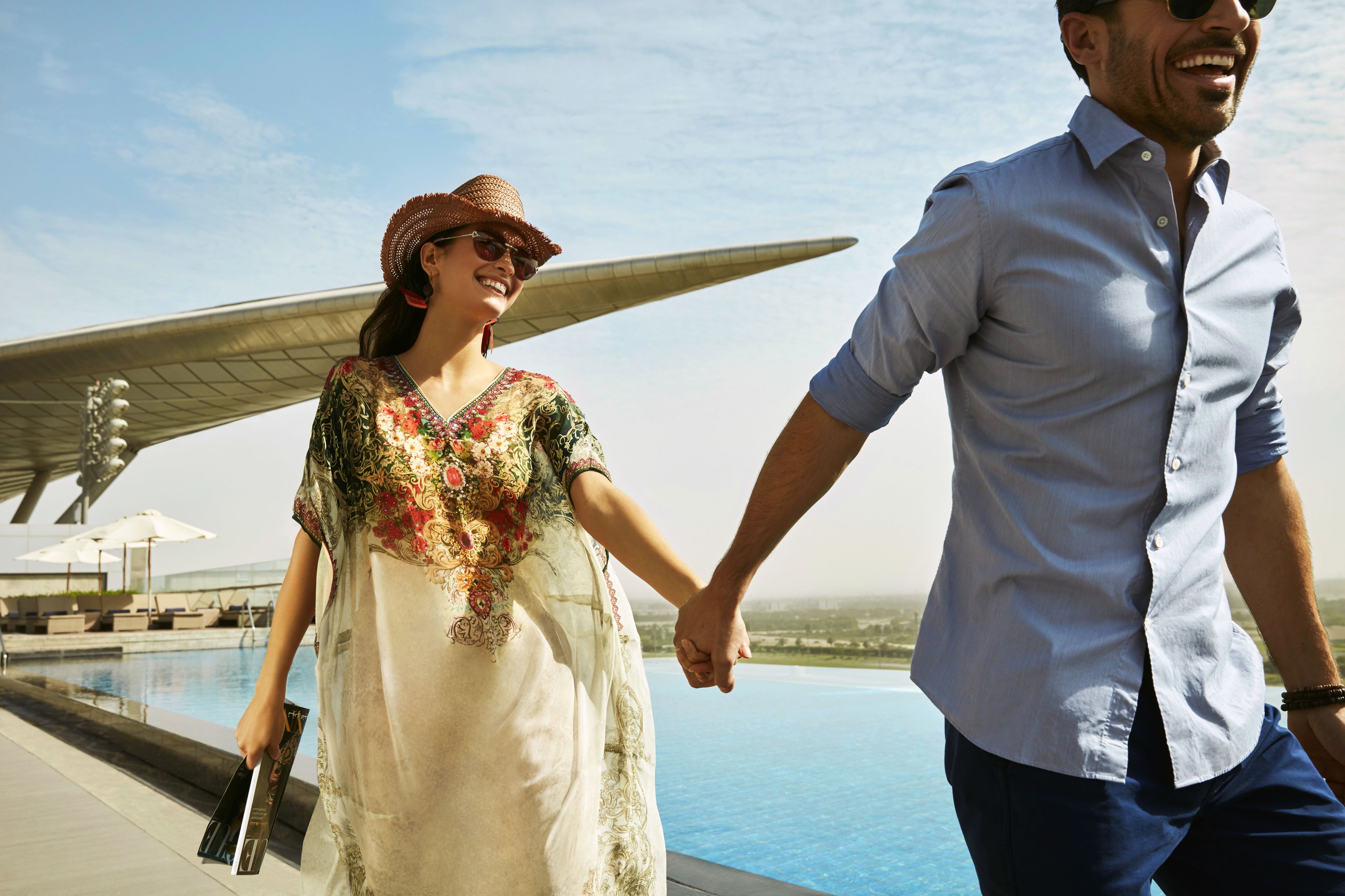 outdoor pool, open 8:00 am to 7:00 pm, pool umbrellas, pool loungers