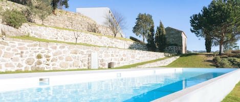 Seasonal outdoor pool, pool umbrellas, sun loungers