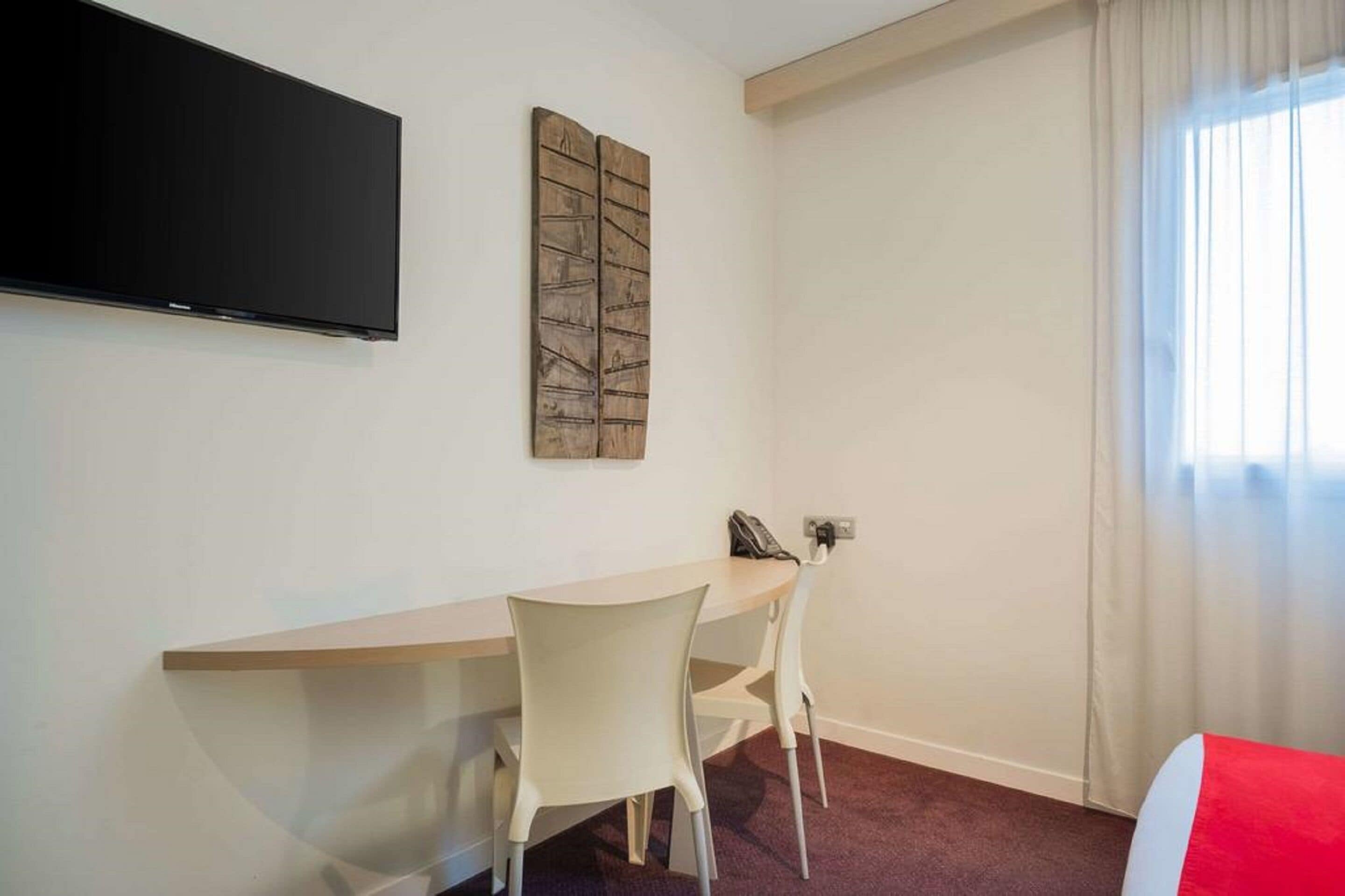 premium bedding, memory-foam beds, desk, blackout curtains