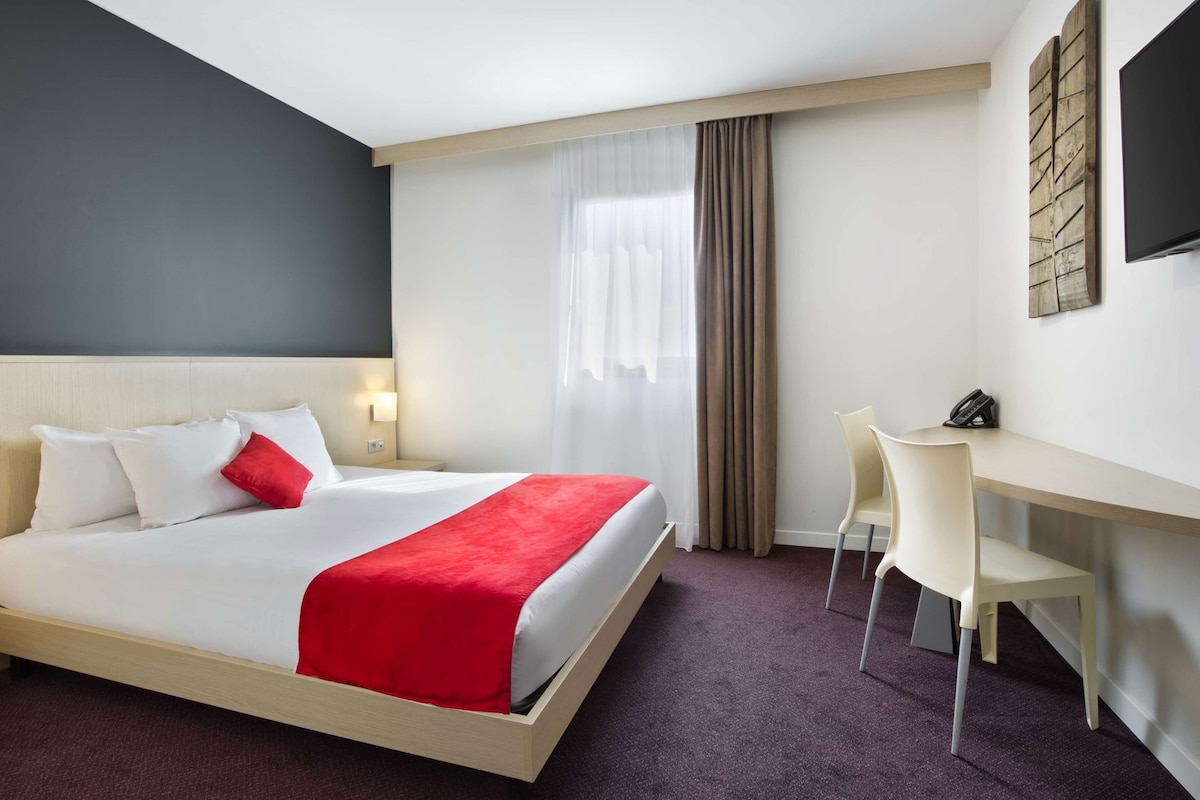 Premium bedding, memory-foam beds, desk, blackout curtains