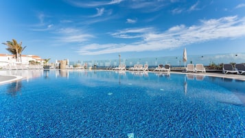 Outdoor pool, pool umbrellas, pool loungers