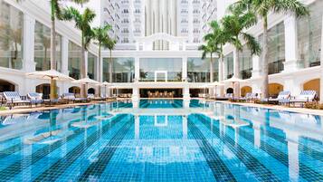 Outdoor pool, pool umbrellas, sun loungers