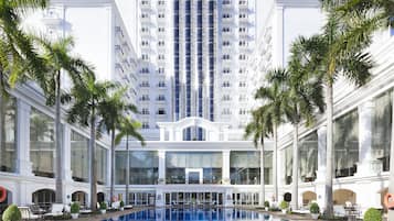 Outdoor pool, pool umbrellas, sun loungers