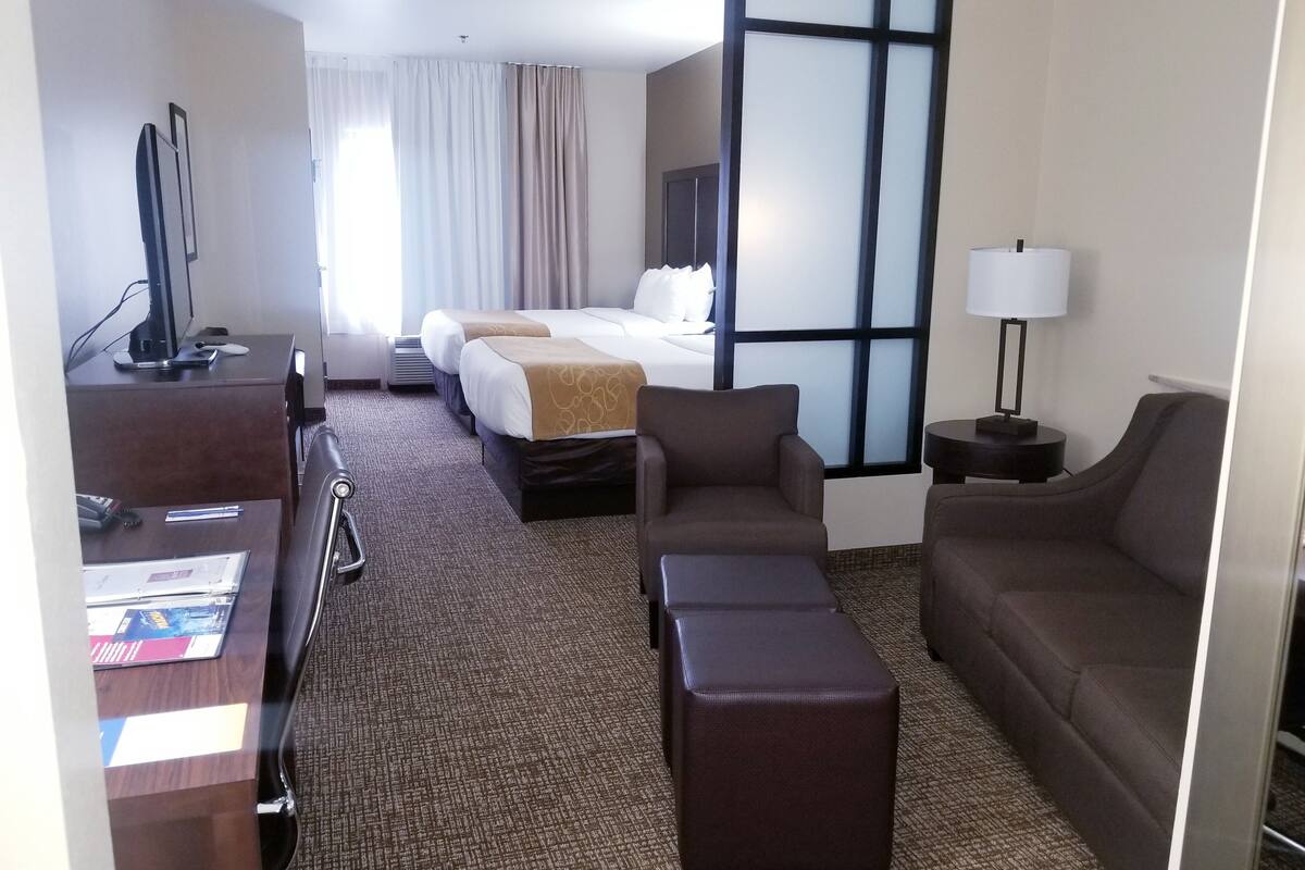 premium bedding, desk, laptop workspace, blackout curtains