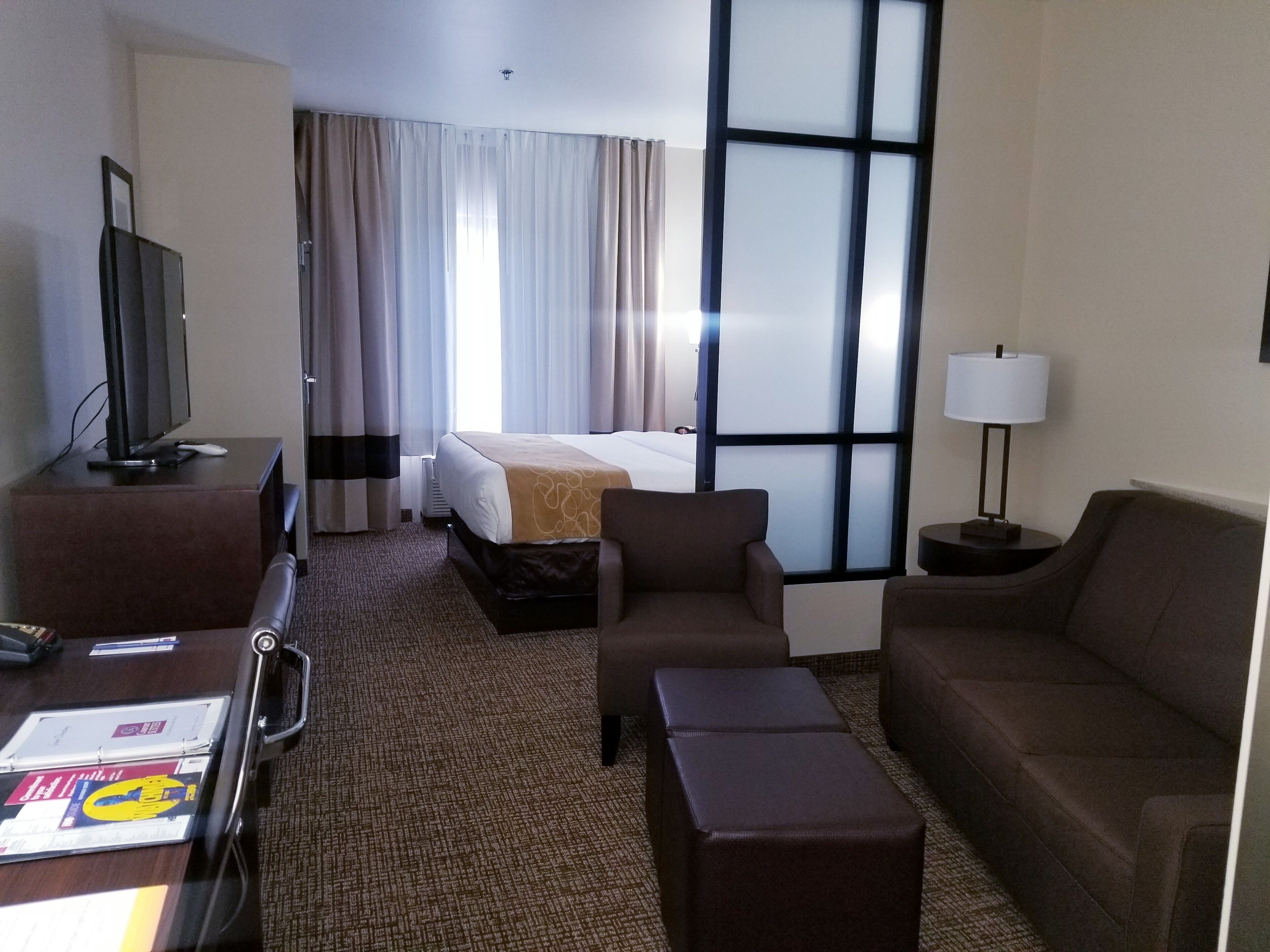 premium bedding, desk, laptop workspace, blackout curtains